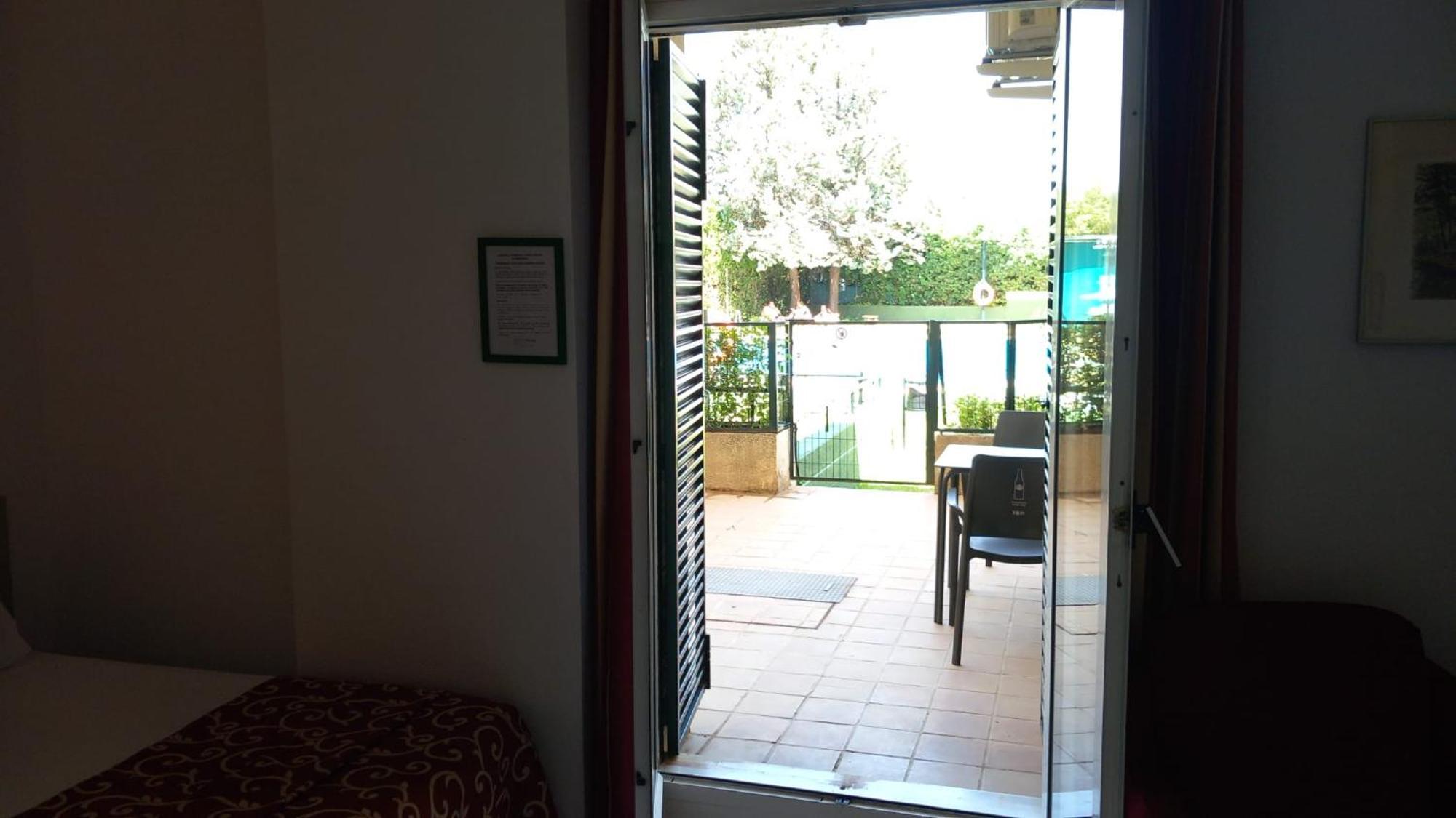 Hospedium Hotel Apartamentos Simon Verde Mairena del Aljarafe Szoba fotó